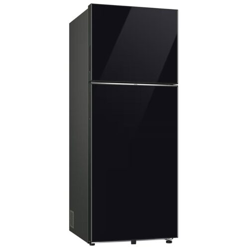 Tall black refrigerator with a top freezer and bottom refrigerator compartment, two vertical doors. Tall black refrigerator with a top freezer and bottom refrigerator compartment, two vertical doors.