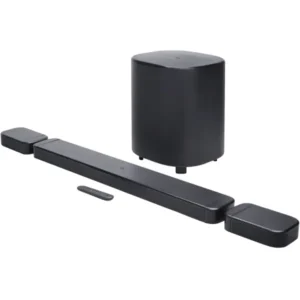 Black soundbar home theater system with a tall subwoofer and two satellite speakers, plus a remote nearby.