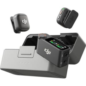 DJI charging hub with a smartphone cradle mounted on top and two small DJI wireless earbuds floating nearby.