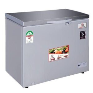 Grey chest freezer with a hinged top lid and front-mounted control panel, labeled with product stickers, used for freezing food in the kitchen.